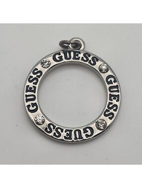 Guess Silver Tone Circle Pendant with Clear Rhinestones